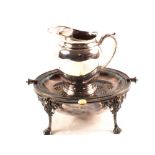 A silver plated revolving bacon dish plus a water jug