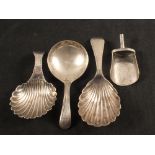 Four silver caddy spoons, all Georgian,