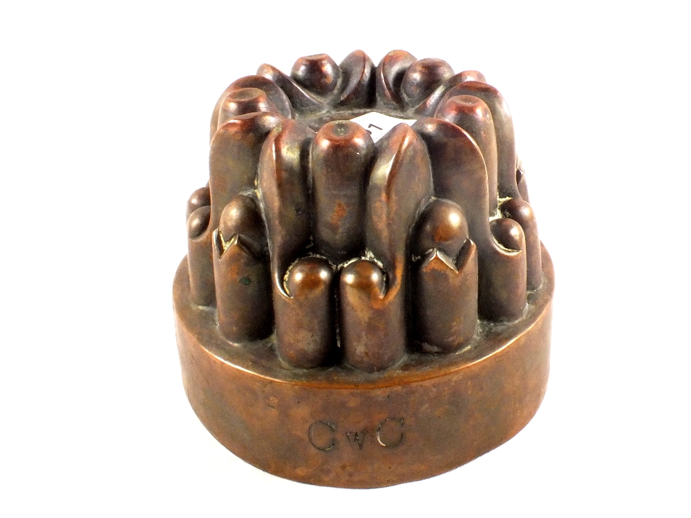 A Victorian jelly mould of lobed form,