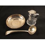 A silver ladle,