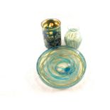 Three pieces of blue and yellow Mdina glass, shallow footed bowl, striped vase plus a cylinder vase,