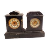 Two black marble striking mantel clocks