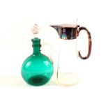 A 19th Century green glass claret jug plus one other cut glass with silver plated mound