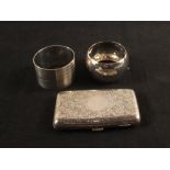 Silver napkin rings, Chester 1924 and Birmingham 1905 plus a cigarette case,