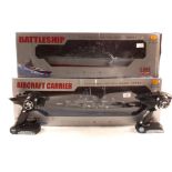 A boxed Heng Tai remote control battleship plus a boxed Heng Tai remote control aircraft carrier