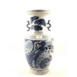 A 19th Century Chinese blue and white peacock and floral vase,