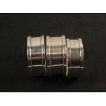 Three silver napkin rings,