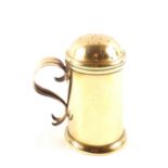 An 18th Century brass flour dredger with pierced domed lid and S scrolled handle,