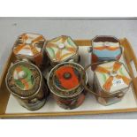 Thirteen various Japanese porcelain biscuit barrels (two trays)