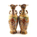 A pair of modern Chinese polychrome figure and floral vases,