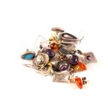 A mixed lot of silver and white metal earrings,