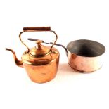 A large 19th Century circular seamed copper kettle,