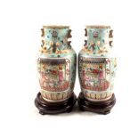 A pair of Chinese blue ground vases with figure and floral decoration,