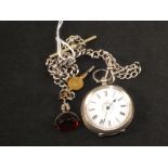 A lady's silver fob watch on silver chain and red stone swivel fob