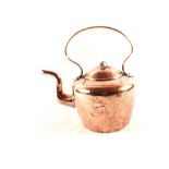 A large 19th Century circular seamed copper kettle with makers mark for Ewart & Son, London,