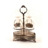 A silver plated three decanter stand with cut glass decanters