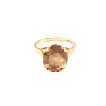A 9ct gold ring set with smokey quartz,