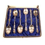 A cased set of six silver apostle teaspoons