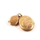 Two yellow metal lockets