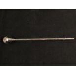 A white metal maté spoon