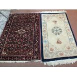 A Persian floral rug plus a Chinese rug