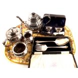 A silver plated teapot plus other silver plate