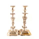 A pair of silver plated candlesticks