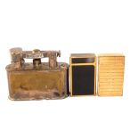Two Dupont gas lighters plus a Dunhill table lighter