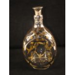 A Haig dimple bottle, silver clad with thistle decoration,
