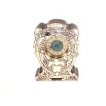 A silver clad clock with turquoise enamel dial,