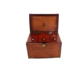 A large oak and brass bound three compartment tea caddy