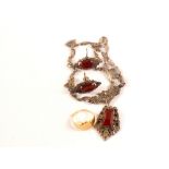 A silver marcasite and red stone set necklace with matching earrings together with a small 18ct