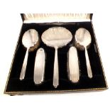 A cased silver six piece dressing table set with initials