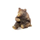 A brass bear inkwell