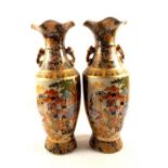 A modern pair of Chinese figure and floral vases,
