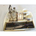 A silver plated six bottle cruet,