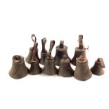A set of ten 19th Century Campanologists bells (one detached clapper and three missing straps)