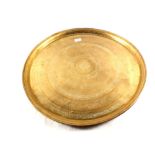 Two circular brass table tops