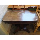 A 19th Century mahogany folding tea table on platform base