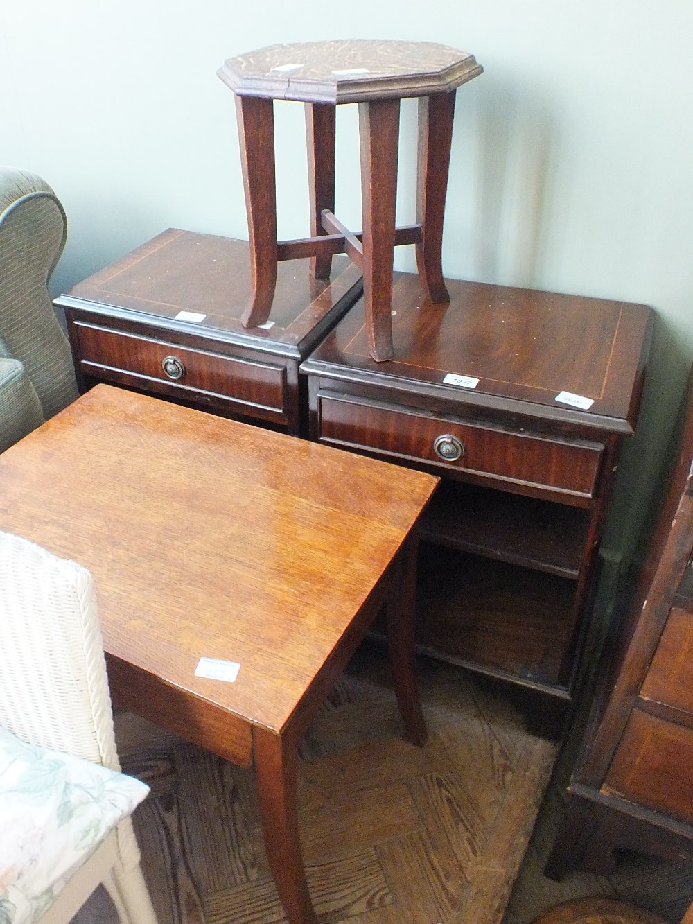 A pair of reproduction mahogany bedside chests,