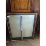 A wall hanging glazed display cabinet