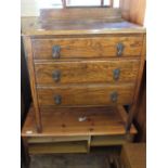 A mahogany tallboy, an oak three drawer chest,
