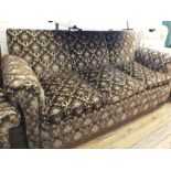 A Victorian three seater settee and armchair in brown velour