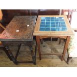 A carved oak occasional table plus one other with blue tiled top