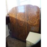 A 1930's burr walnut wardrobe and dressing table