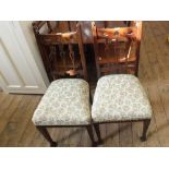 A set of four Art Nouveau mahogany dining chairs