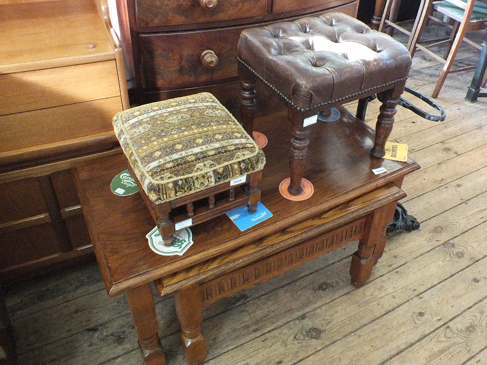 A nest of two oak tables plus two stools