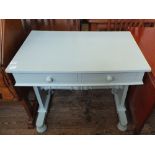 A painted two drawer stretcher table