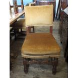 A set of four oak dining chairs with gold draylon upholstery