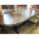 A large oak refectory dining table